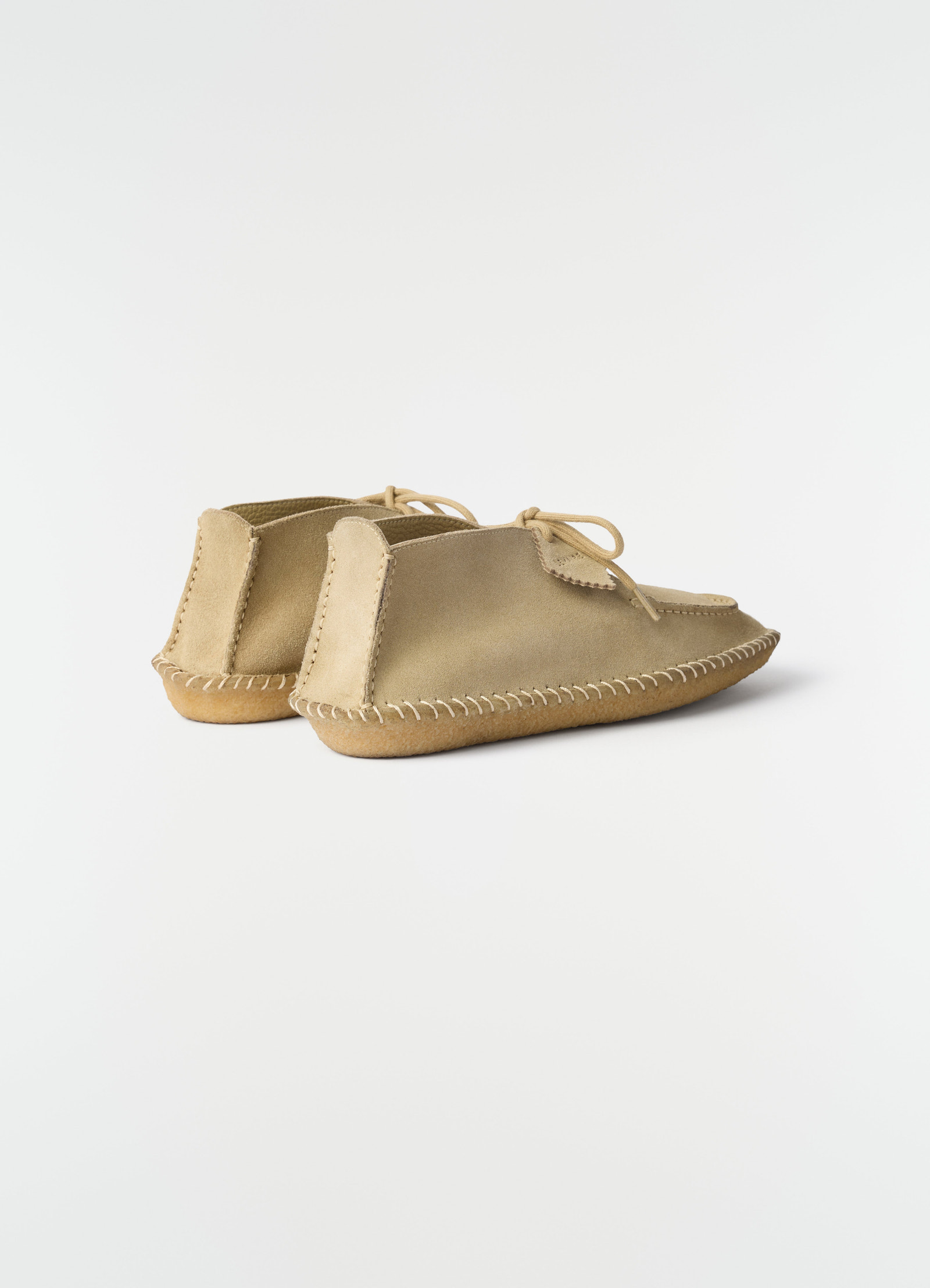 Desert moccasins in reversed beige suede leather by lemaire side view on plain white background