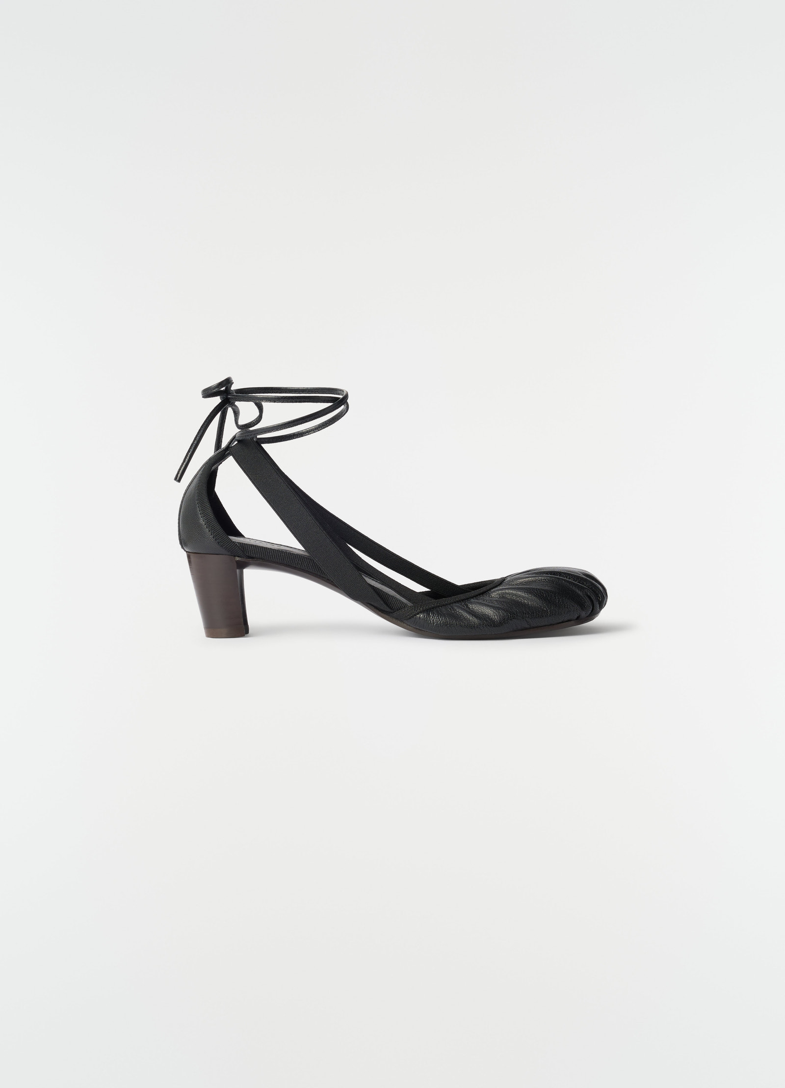 55 mm black goat leather heeled ballerinas with ankle tie straps by lemaire side view on white background
