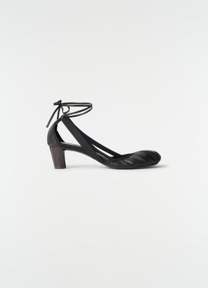 55 mm black goat leather heeled ballerinas with ankle tie straps by lemaire side view on white background