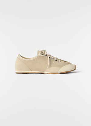 Gummy grips beige mixed leather sneakers by lemaire flat sole side view on white background