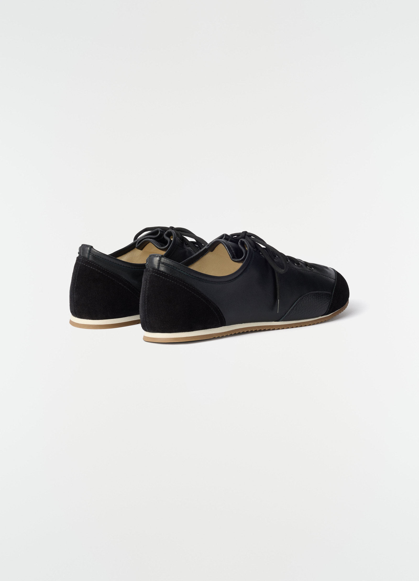 Gummy grips sneakers in mixed leathers