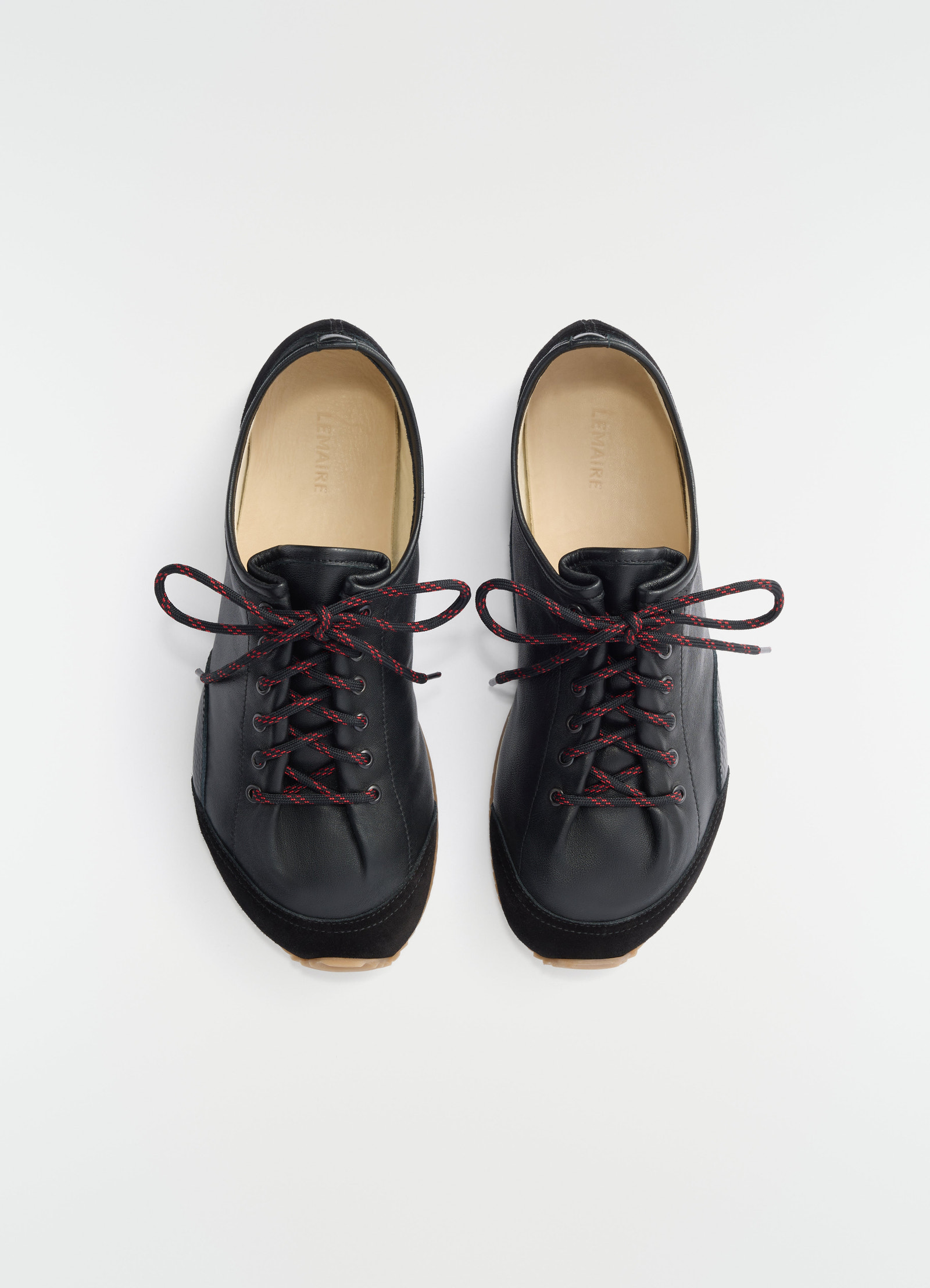 Gummy grips sneakers in mixed leathers