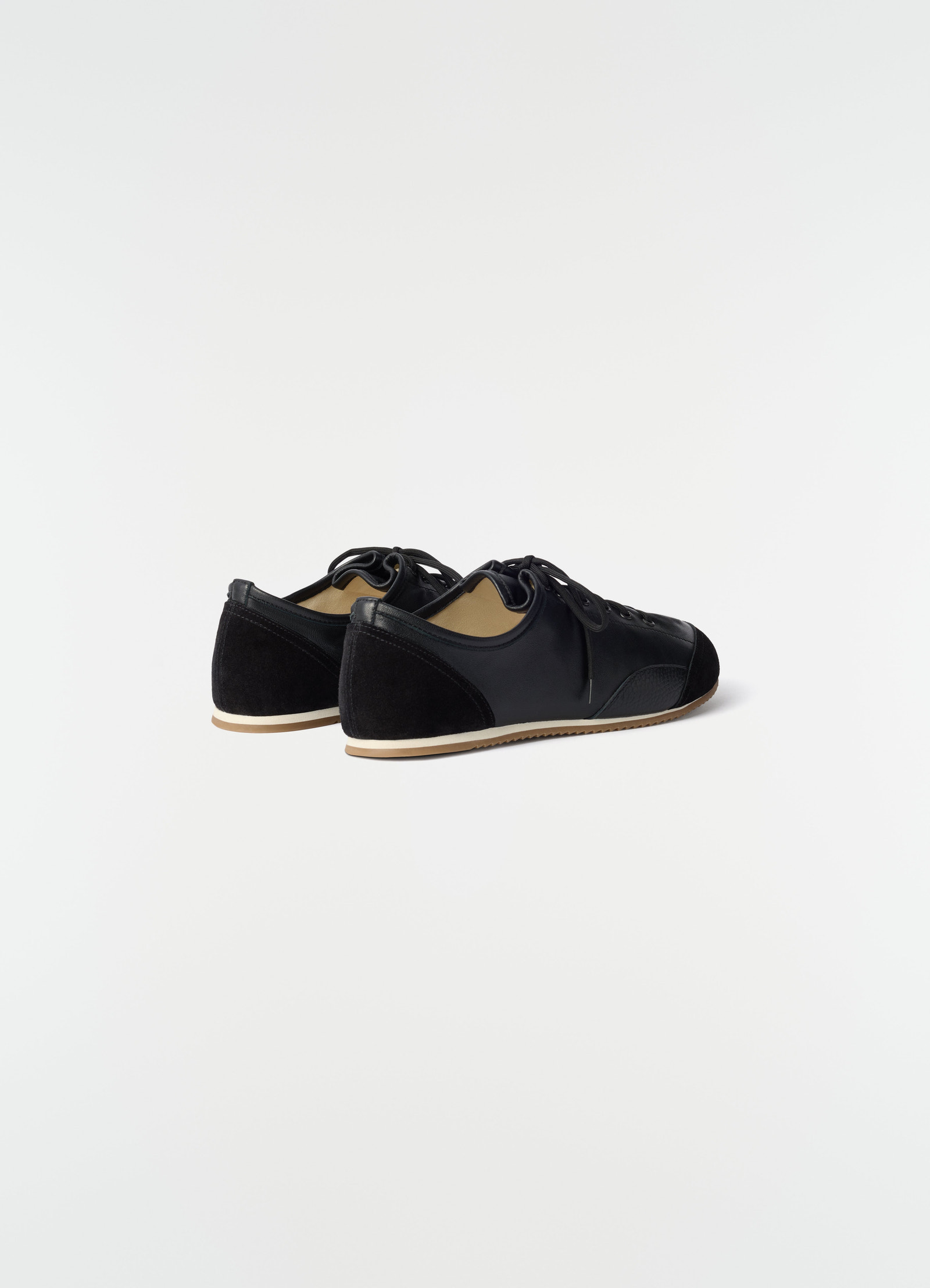Gummy grips sneakers in black mixed leather with suede heel by lemaire side-back view on white background
