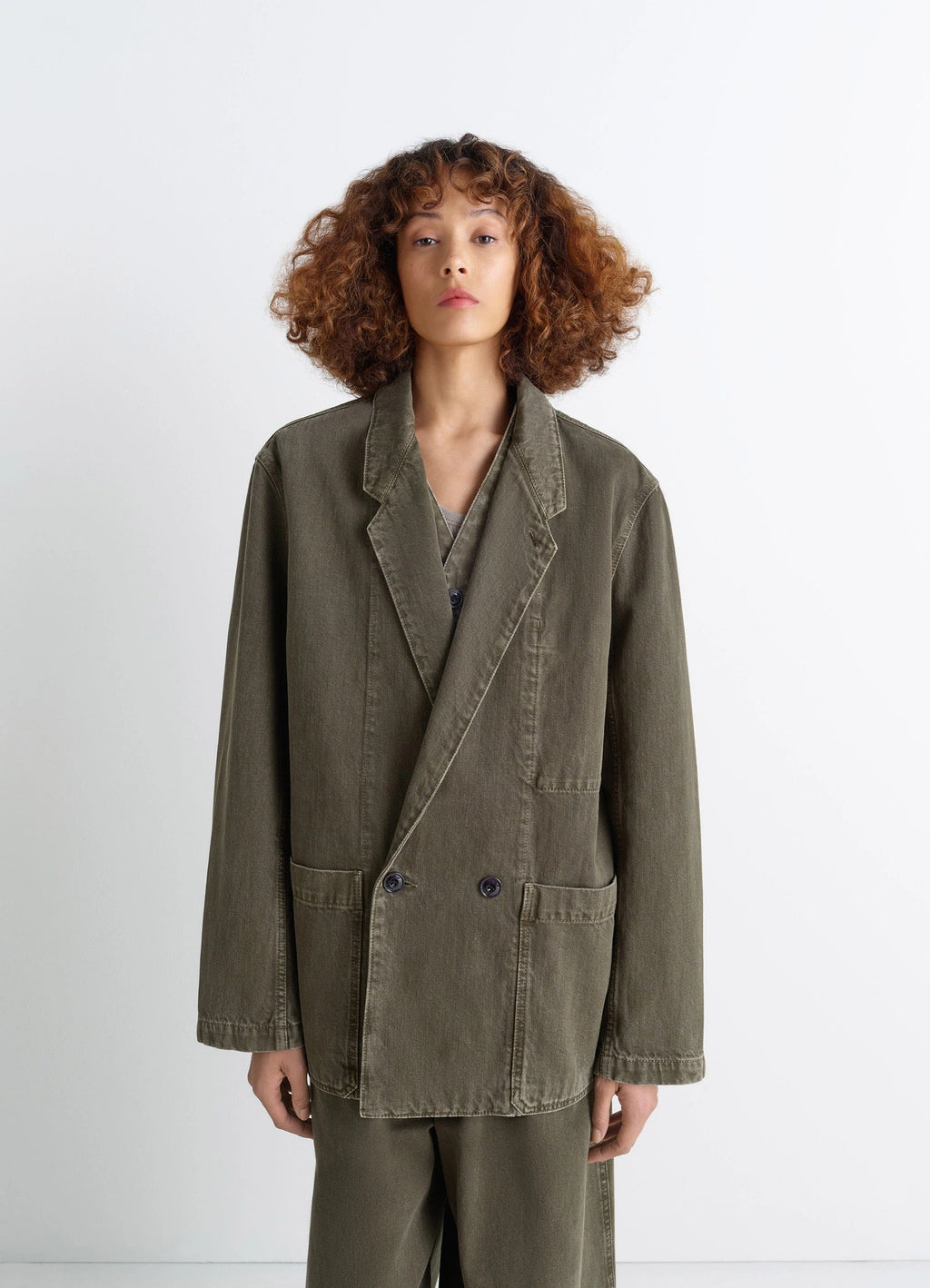 Lemaire Workwear Blazer in Garment Dyed Snow Denim, model shot, front view oversized fit
