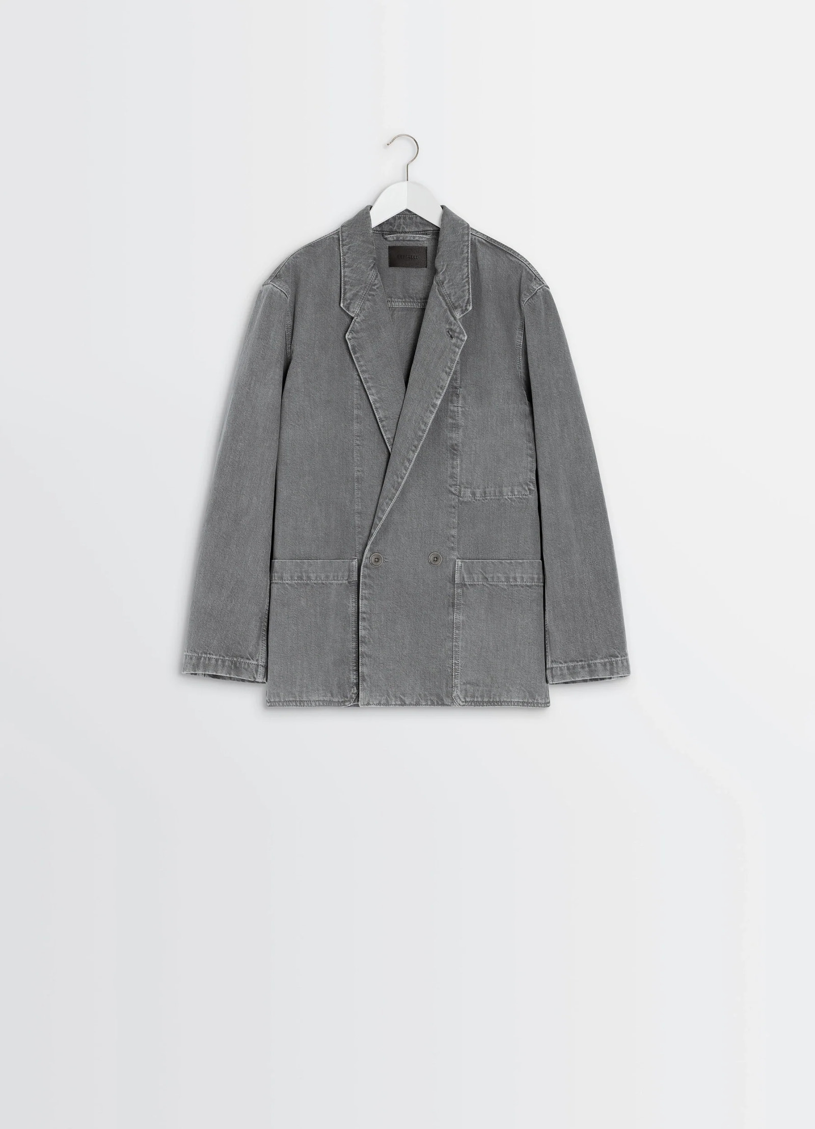 Lemaire workwear blazer in garment dyed snow denim, product shot, hanger view notched lapel