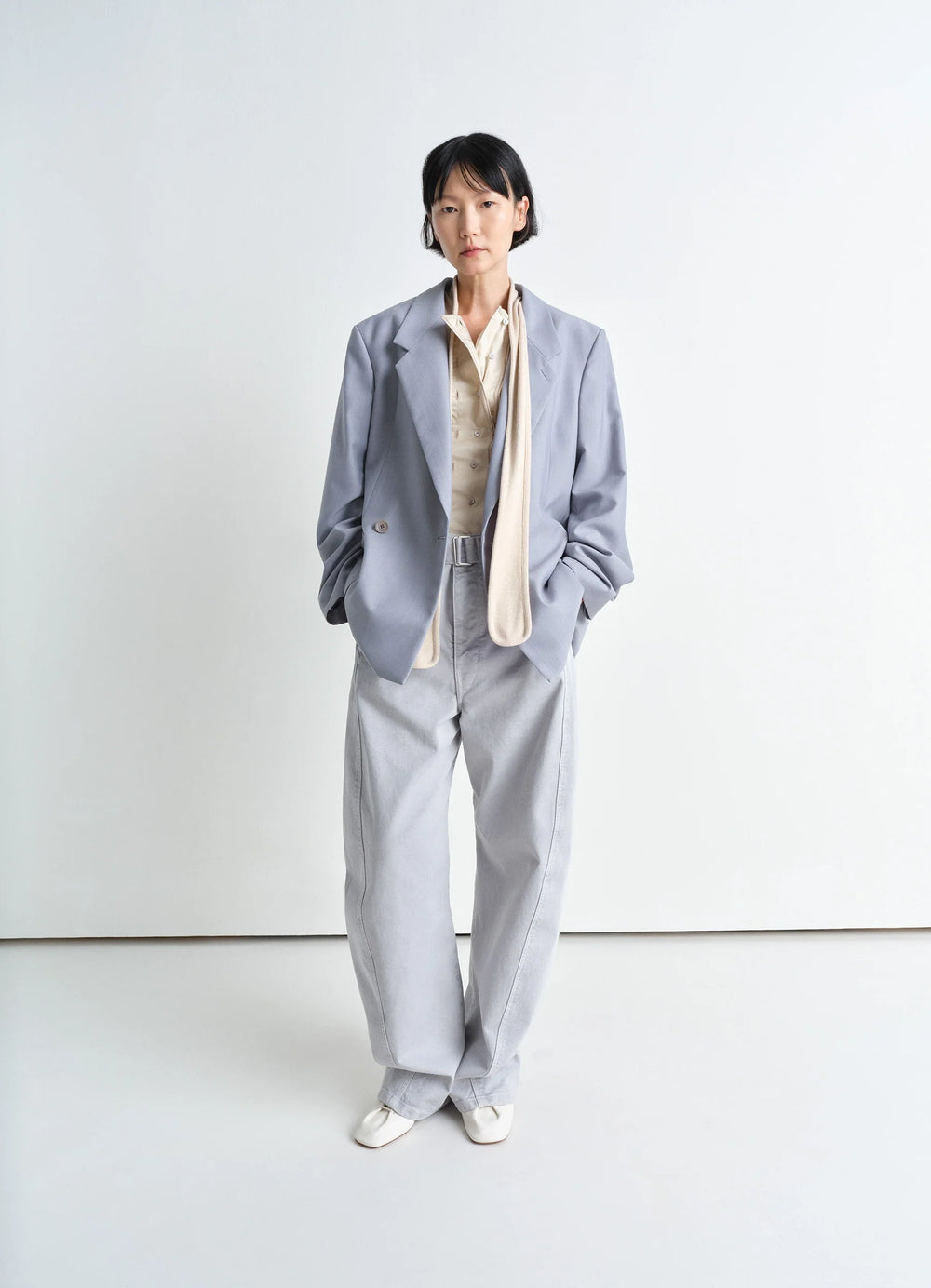 Lemaire Double Breasted Tailored Ja in Tropical Poly-Wool Melange Twill, model shot, front view structured shoulder, large la