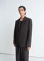 Lemaire Tailored Single Breasted Ja in Mélange Twill Poly-Wool, model shot, Front view Relaxed fit with single lapel