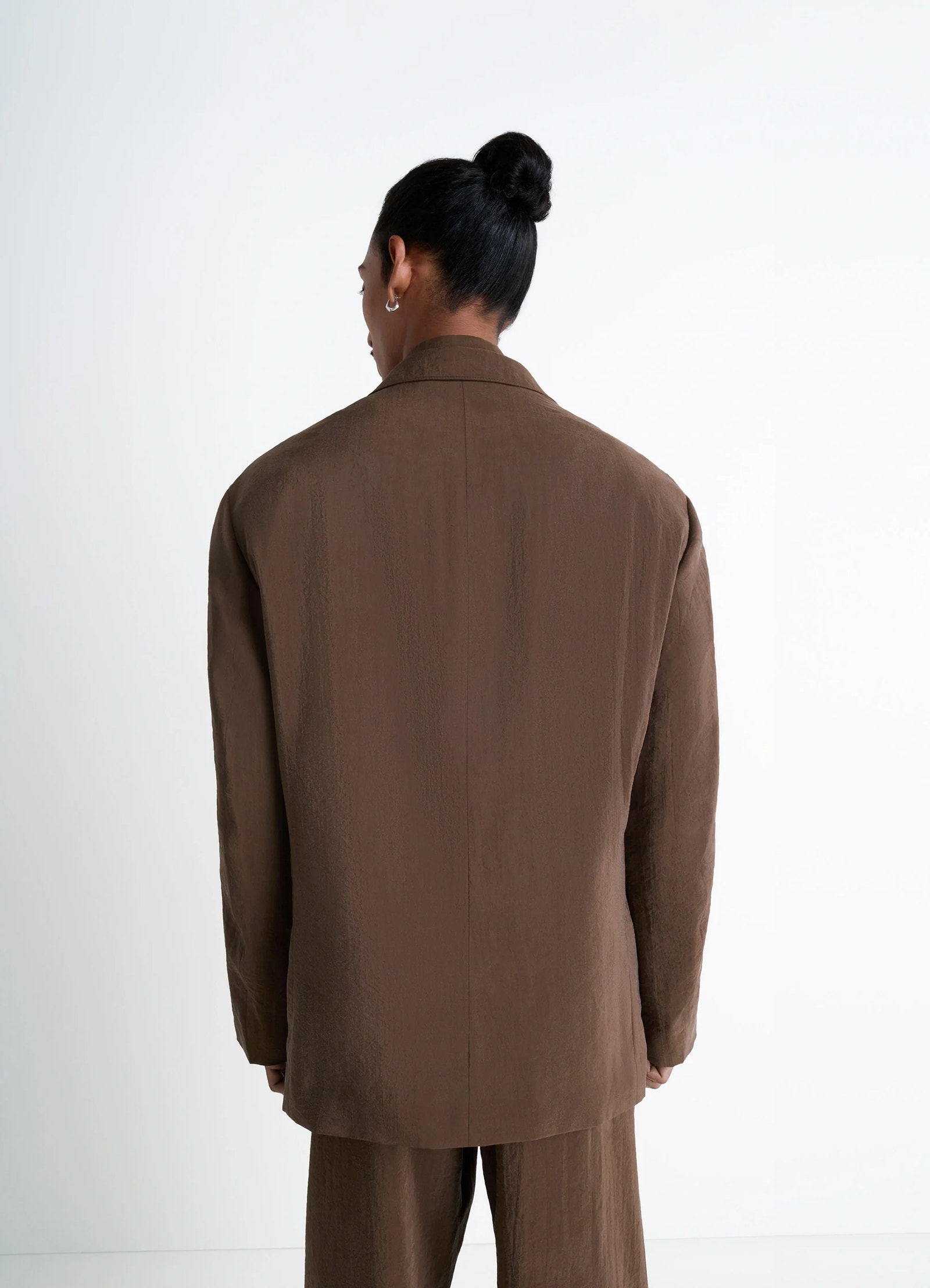 Lemaire soft double-breasted jacket in heather brown dry silk blend, model shot, back view straight back seam