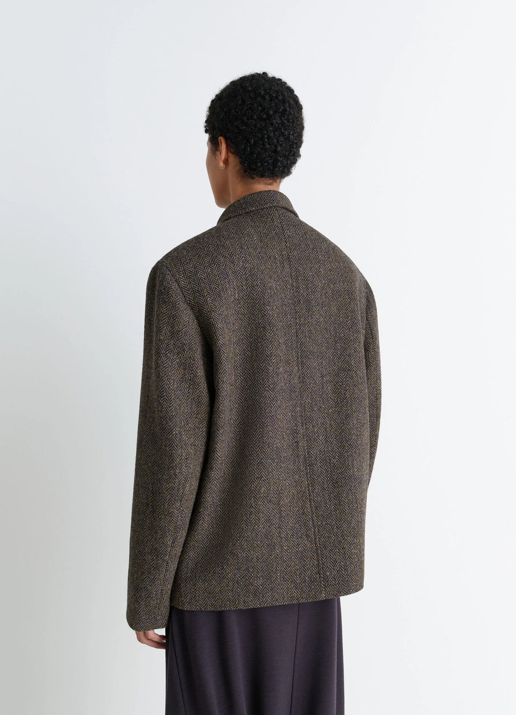 Boxy Tailored Jacket in Harris Tweed Herringbone, model shot, back view single vent, natural shoulders