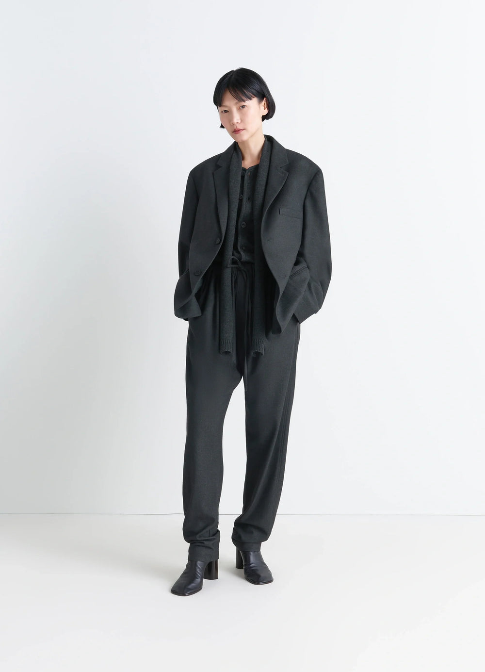 Lemaire Soft Single Breasted Jacket in Lightweight Cashmere-Blend, model shot, three-quarter view relaxed drape