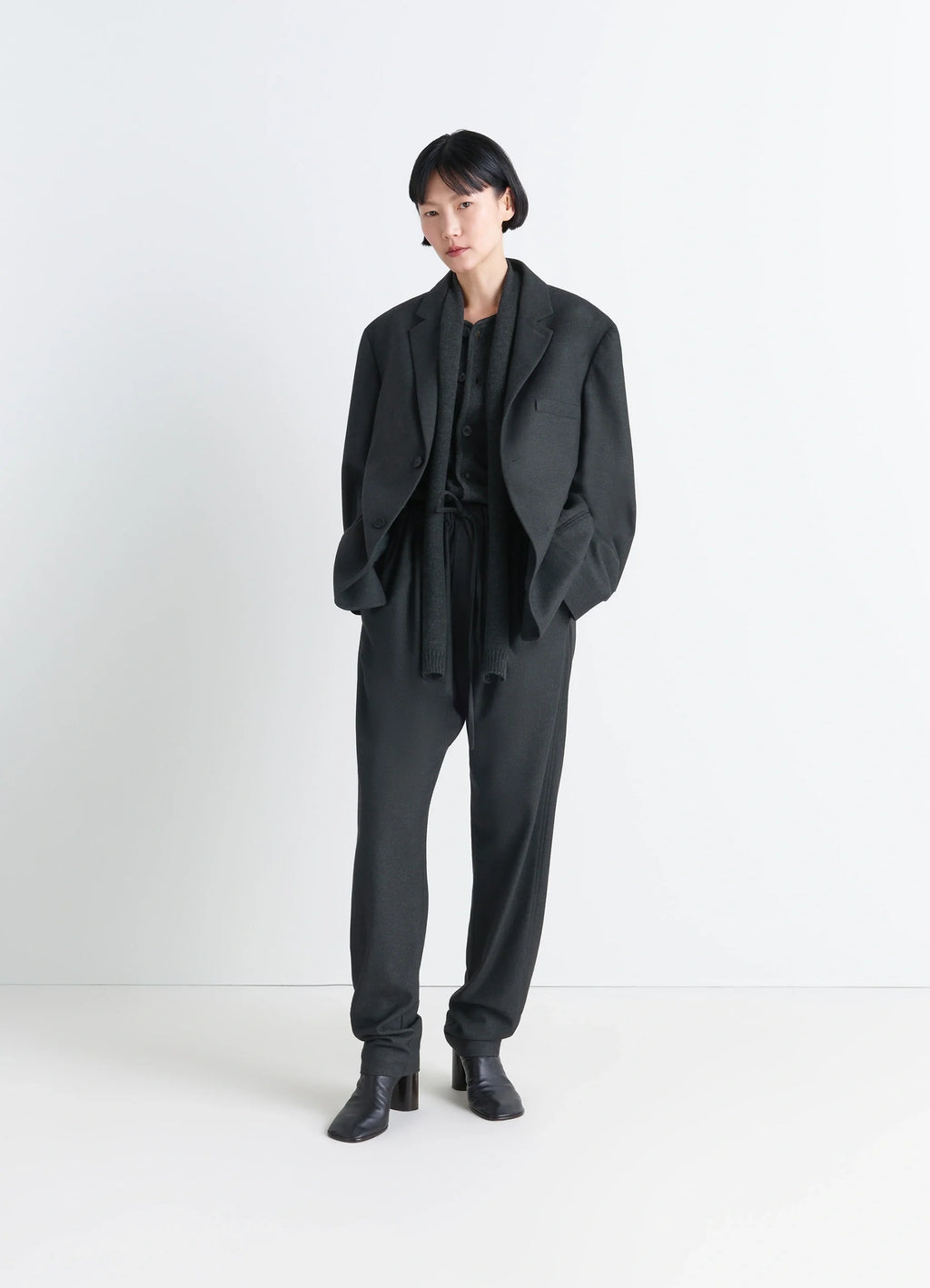 Lemaire Soft Single Breasted Jacket in Lightweight Cashmere-Blend, model shot, three-quarter view relaxed drape