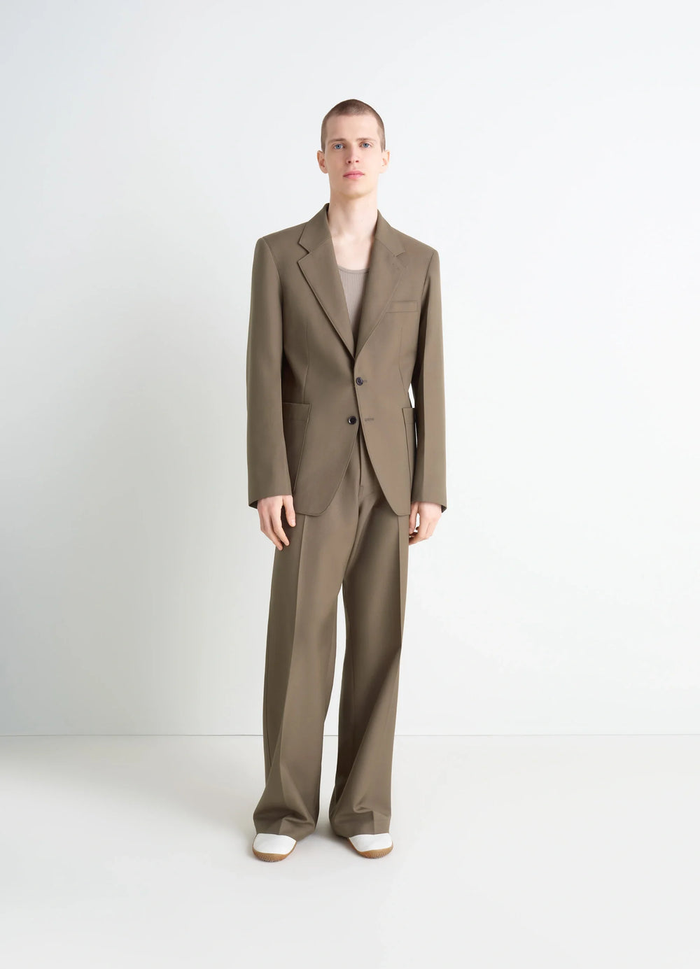 Tailored Single Breasted Jacket in Wool-blend in Taupe, model shot, full body front view loose fit with notch lapels