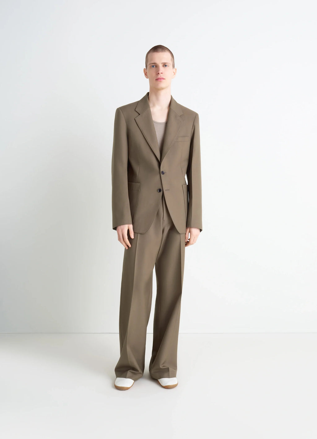 Tailored Single Breasted Jacket in Wool-blend in Taupe, model shot, full body front view loose fit with notch lapels