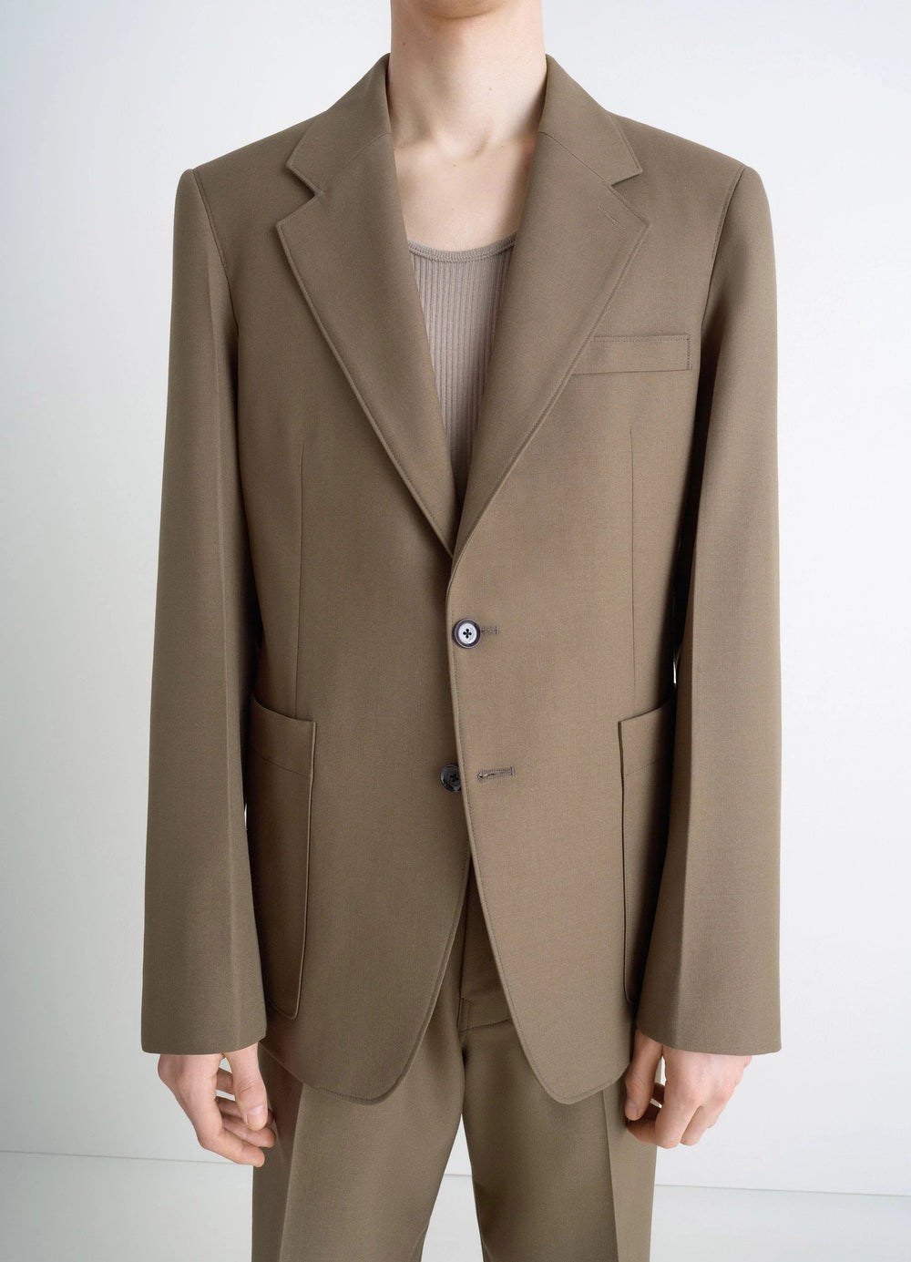 Tailored Single Breasted Jacket in Wool-blend in Taupe, model shot, close-up torso view two-button closure