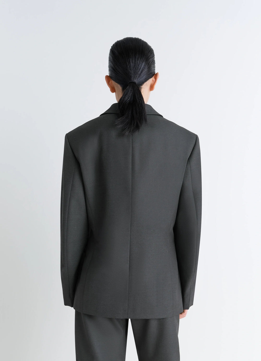 Lemaire Double-Breasted Tailored Ja in Mottled Tropical Wool-Blend, model shot, back view seam detail at back
