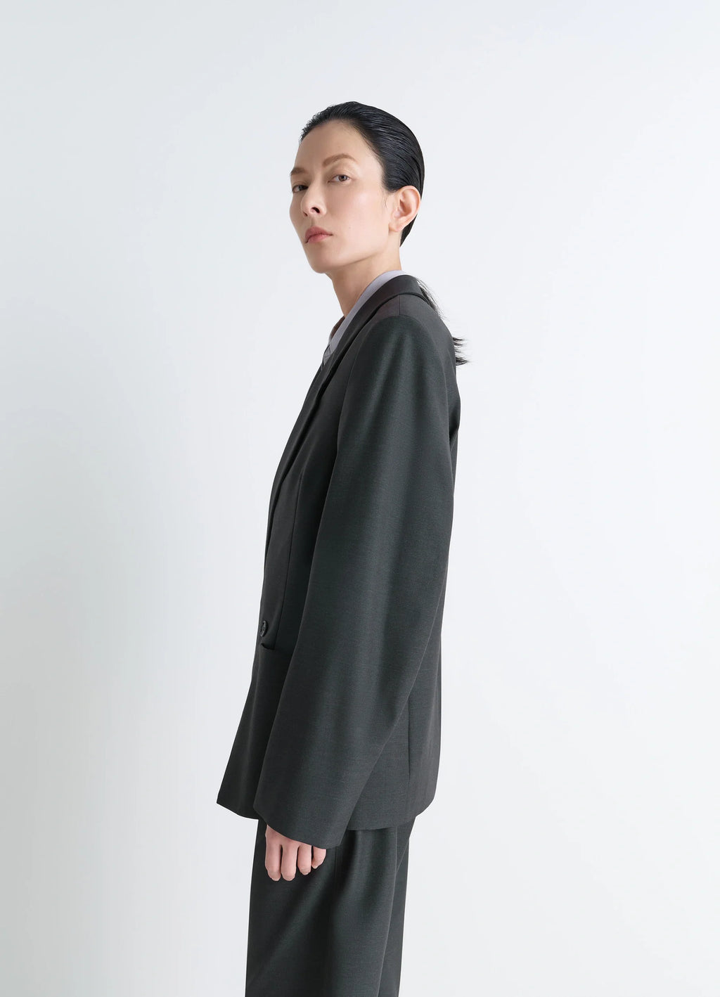 Lemaire Double-Breasted Tailored Ja in Mottled Tropical Wool-Blend, model shot, profile view oversized sleeves