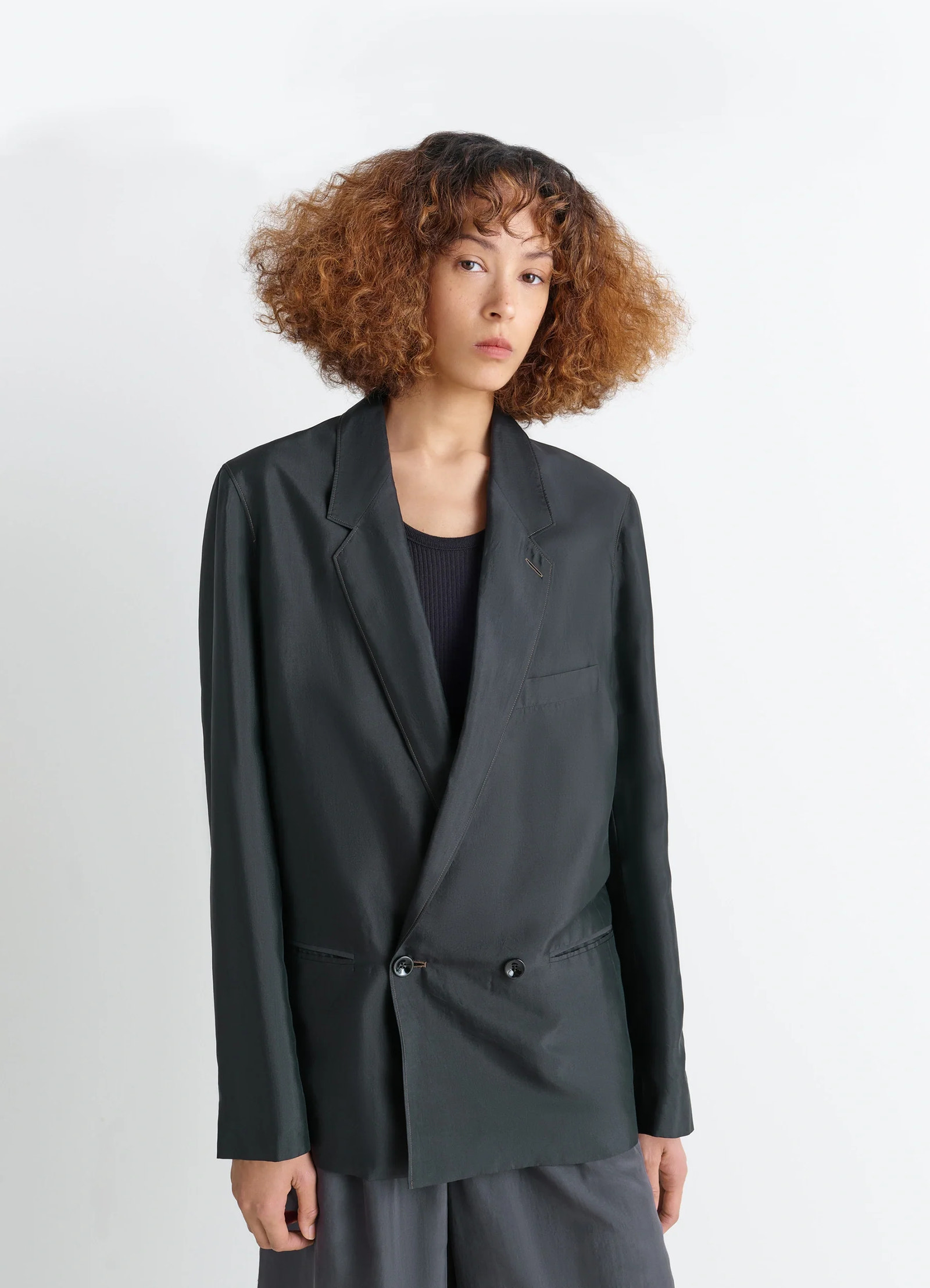 Soft jacket in shiny silk, model shot, front view fitted cut, button details