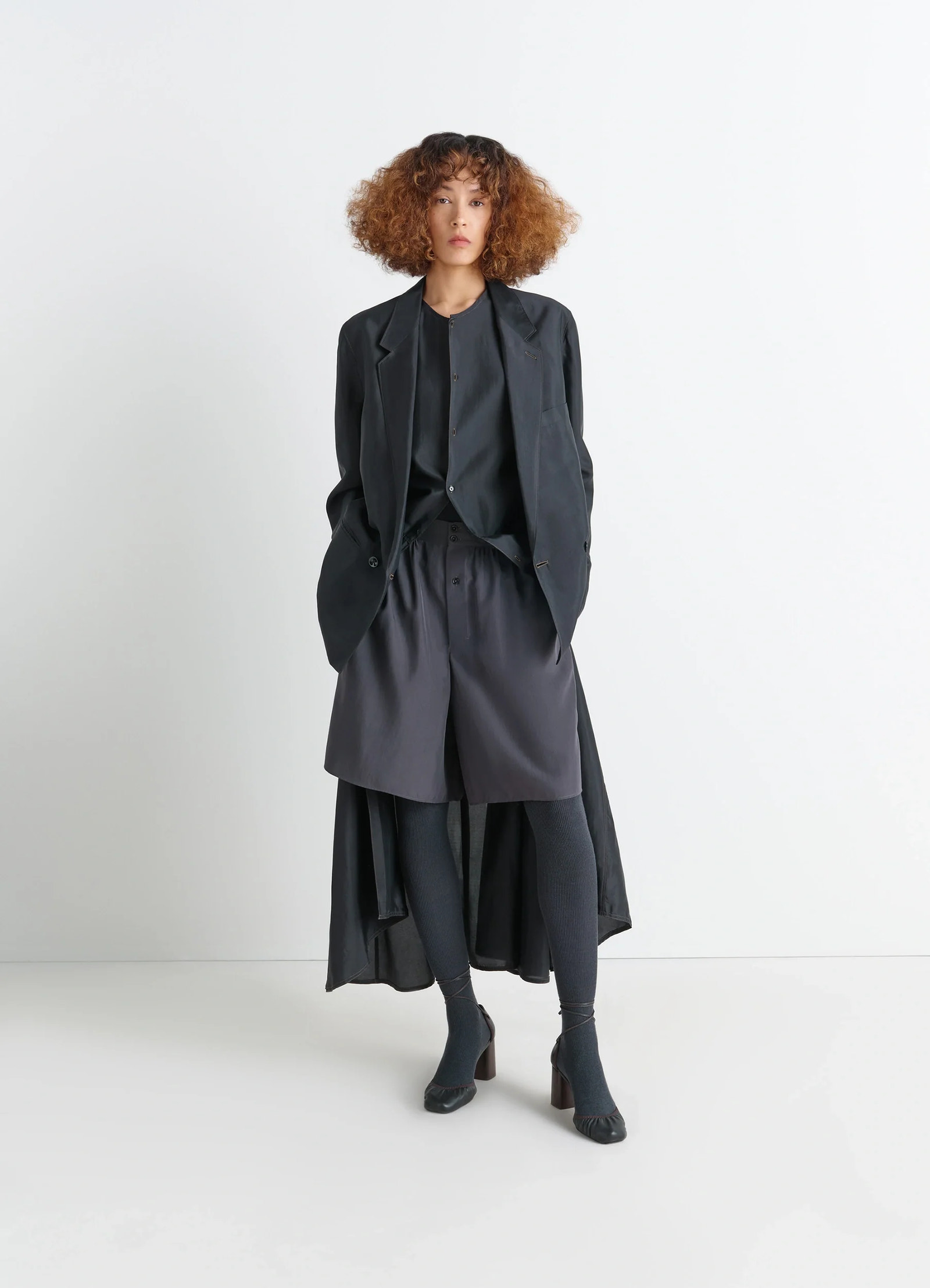 Soft jacket in shiny silk, model shot, full body front draped layered look