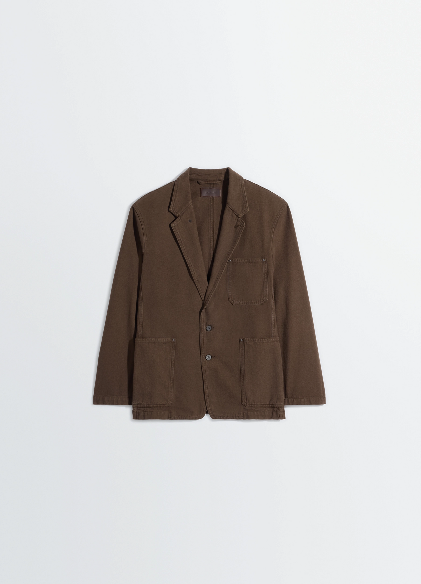 Single breasted tailored jacket in dyed heavy broken twill, product shot, top angled view notched lapel stitching
