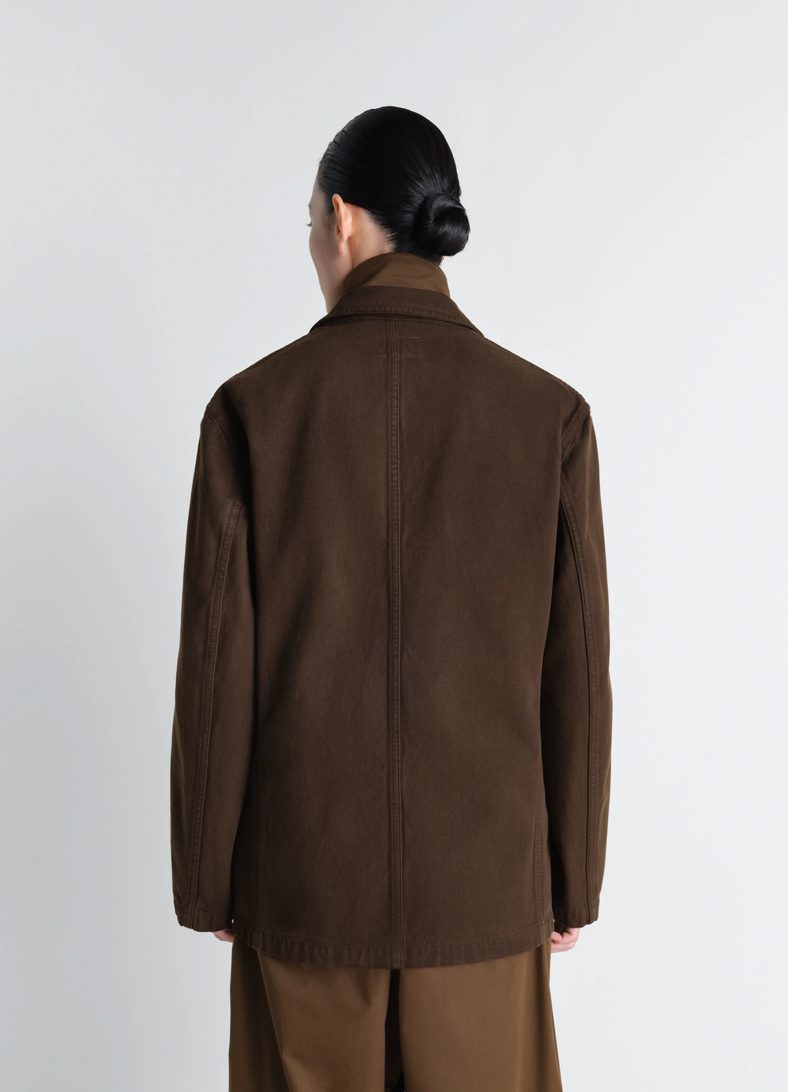 Single breasted tailored jacket in dyed heavy broken twill, model shot, back view straight back seam