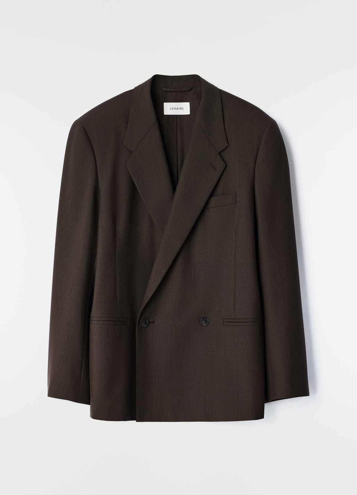 Double-breasted dark brown tropical wool blend jacket by lemaire on white background front view