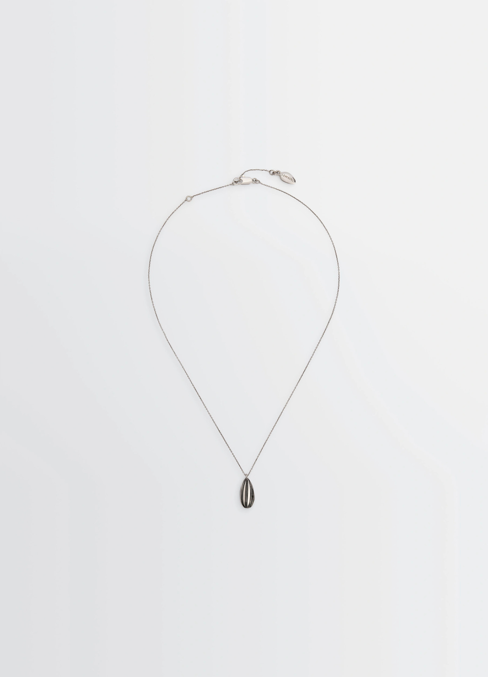 Girasol necklace in silver-plated brass, product shot, front view pendant with enamel