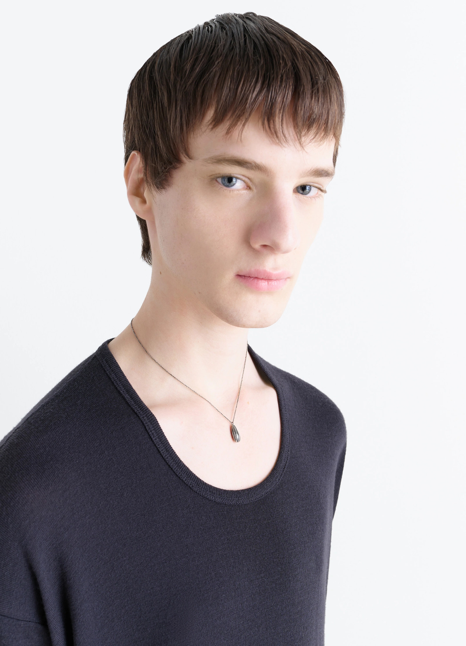 Girasol necklace in silver-plated brass, model shot, close-up side view worn by model