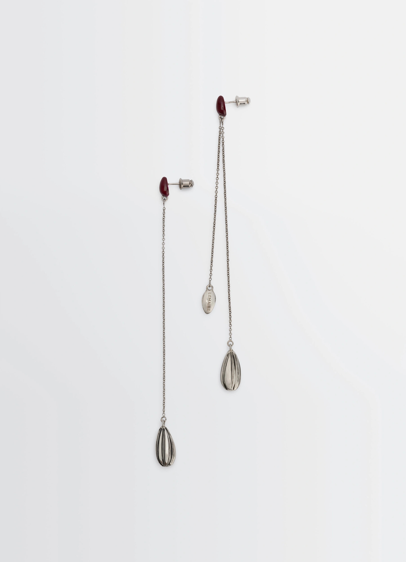 Asymmetric girasol earrings in silver-plated brass, product shot, front view asymmetrical dangling