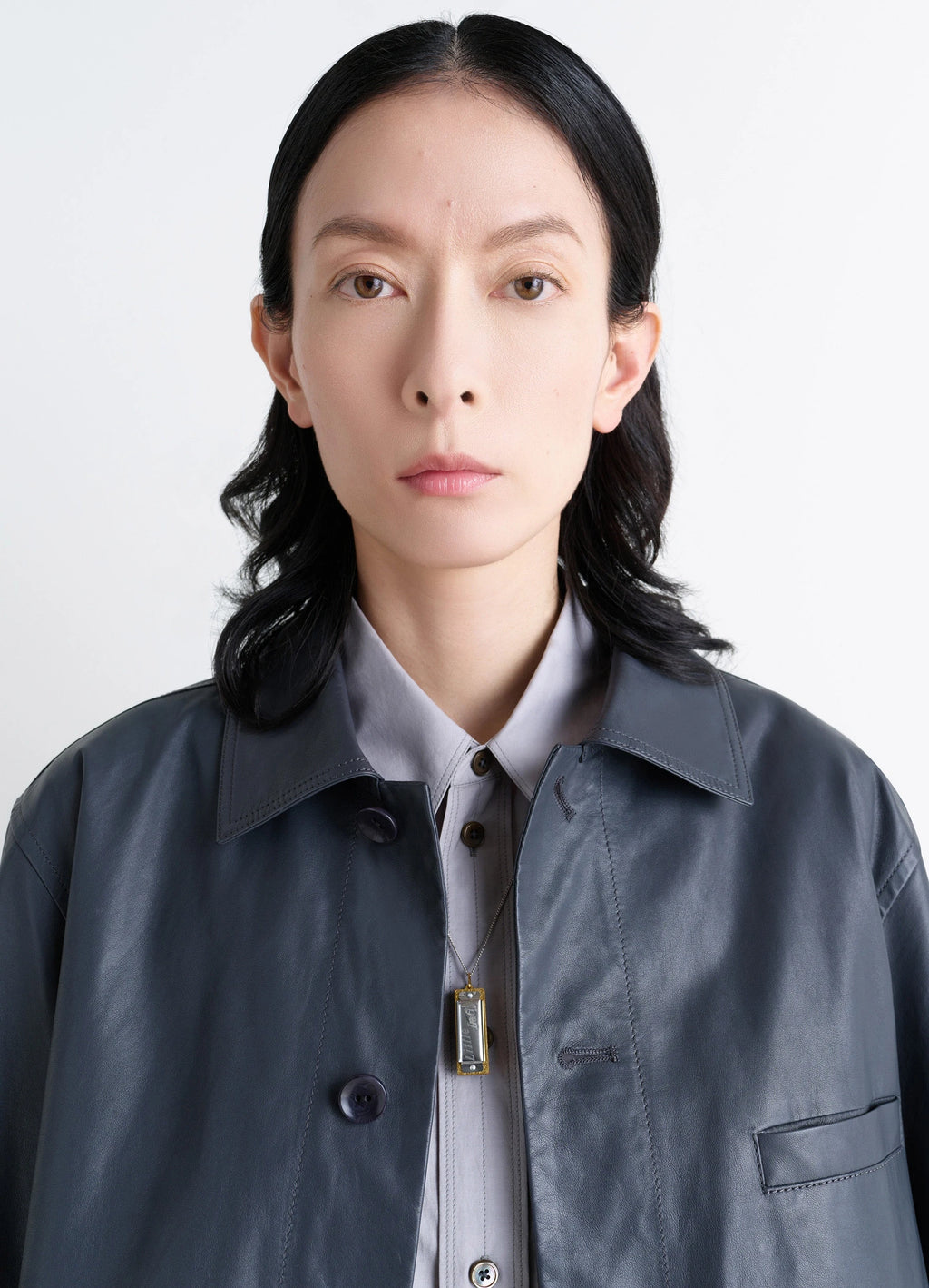 Hohner Little Lady Harmonica Neckla in Silver and Gold, model shot, worn close-up view elegant accessory