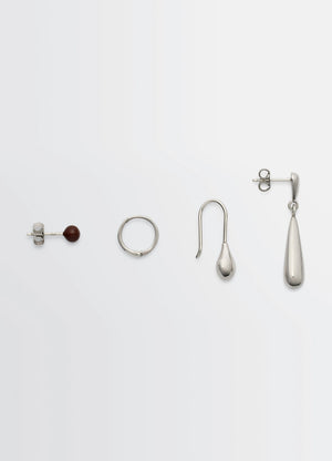 Lemaire Four-Piece Piercing Set in Rhodium-Plated Silver and Resin, product shot, Front view Various Lemaire jewelry shapes