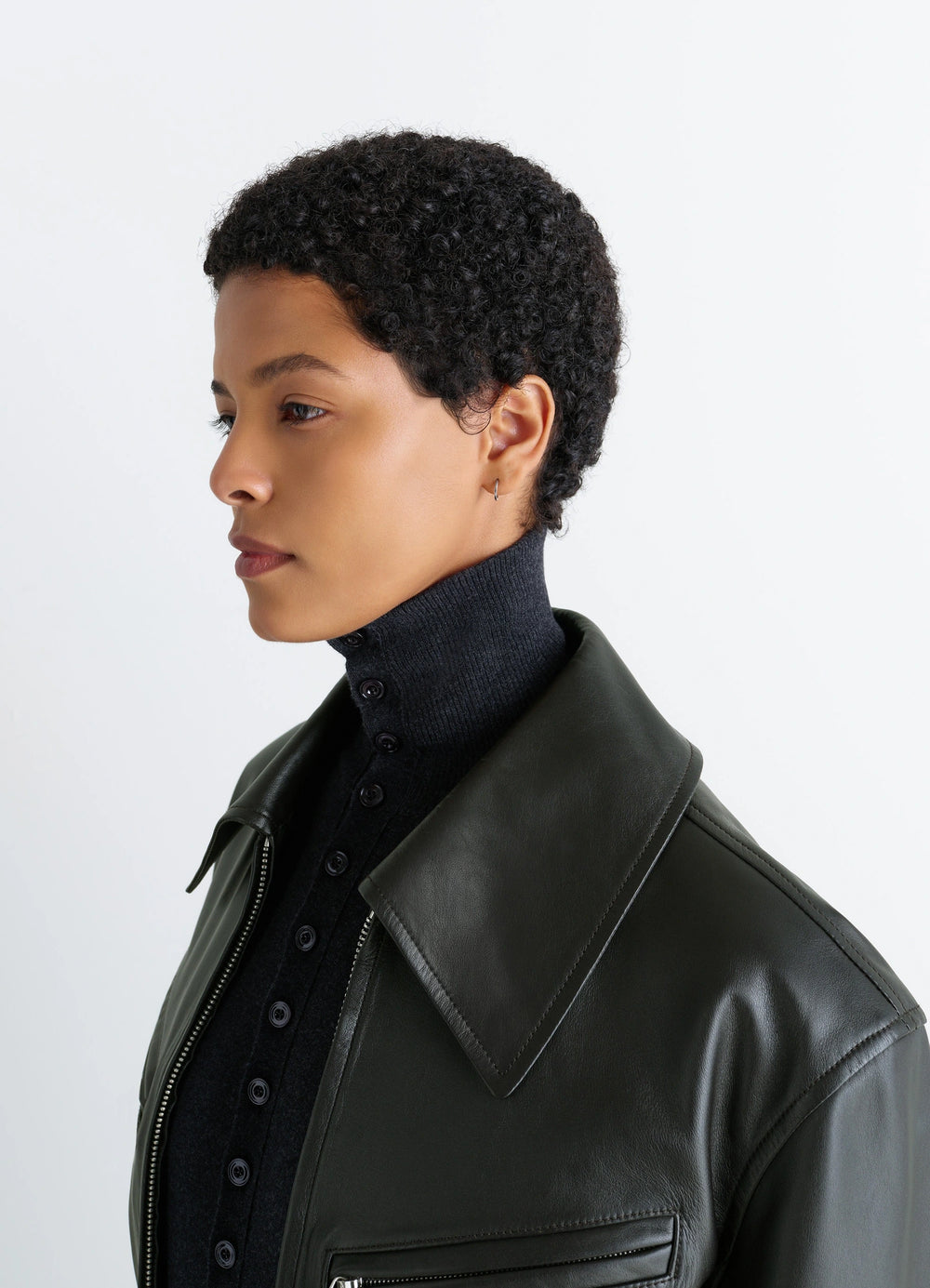 Lemaire Four-Piece Piercing Set in Rhodium-Plated Silver and Resin, model shot, three-quarter view minimalistic hoop design