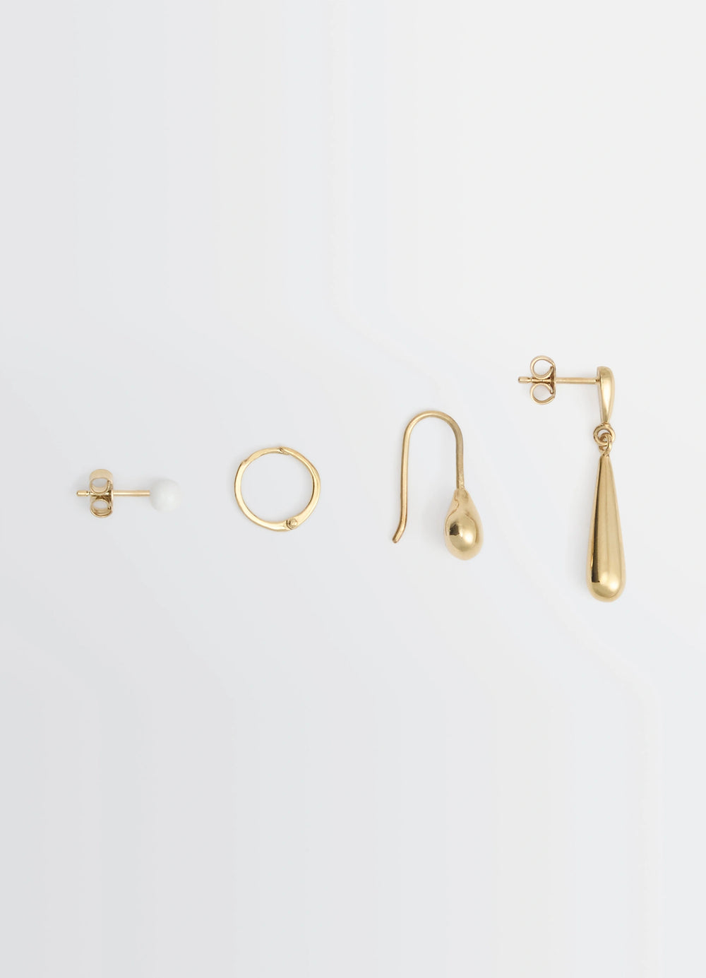 PIERCINGS SET in Gold-plated silver and resin, product shot, Top view Various Lemaire inspired shapes