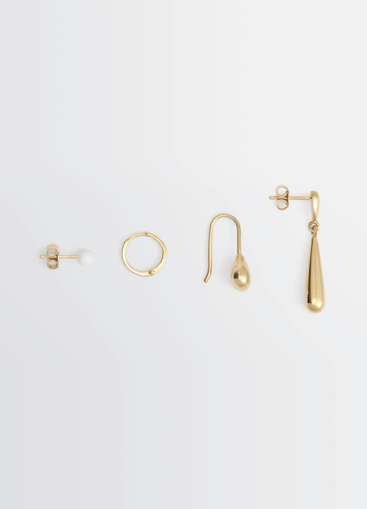 PIERCINGS SET in Gold-plated silver and resin, product shot, Top view Various Lemaire inspired shapes