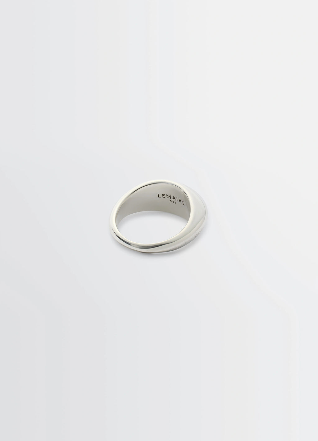 Chunky Drop Ring in Rhodium-plated Silver, product shot, top angled view engraved inner band