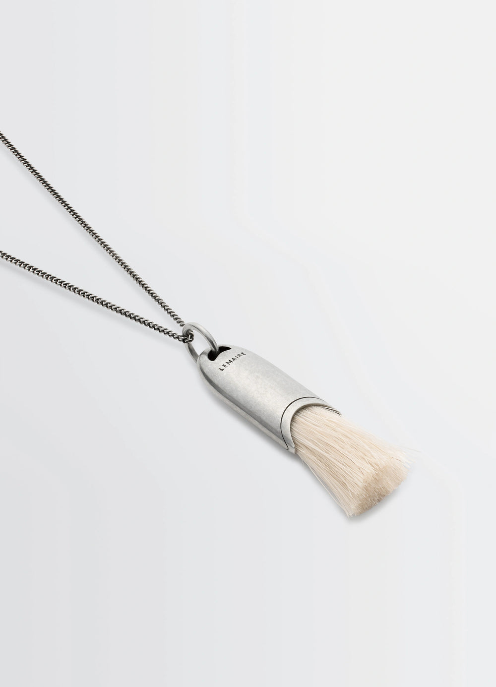 Lemaire Personal Brush Necklace in Silver and Beige, product shot, angled side view chain neckline detail