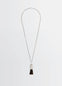Lemaire Personal Brush Necklace in Silver and Dark Brush, product shot, front view brush pendant detail
