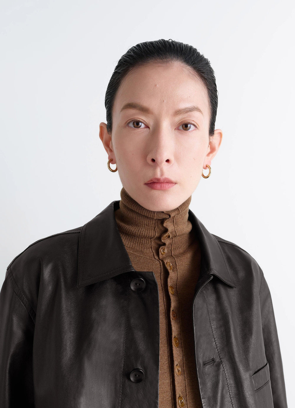 Classic Hoops S in recycled gold-plated silver, model shot, side profile view medium hoop earrings