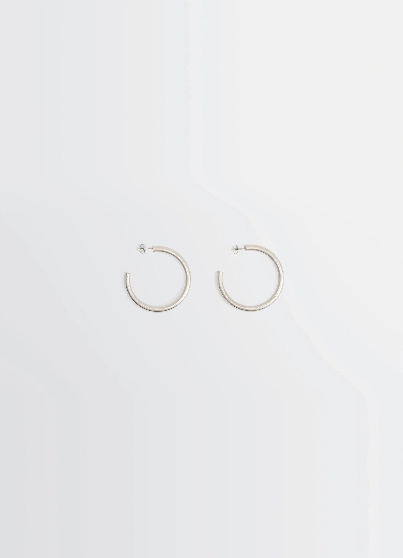 Lemaire classic hoops m in recycled rhodium-plated silver, product shot, front view medium-sized hoops