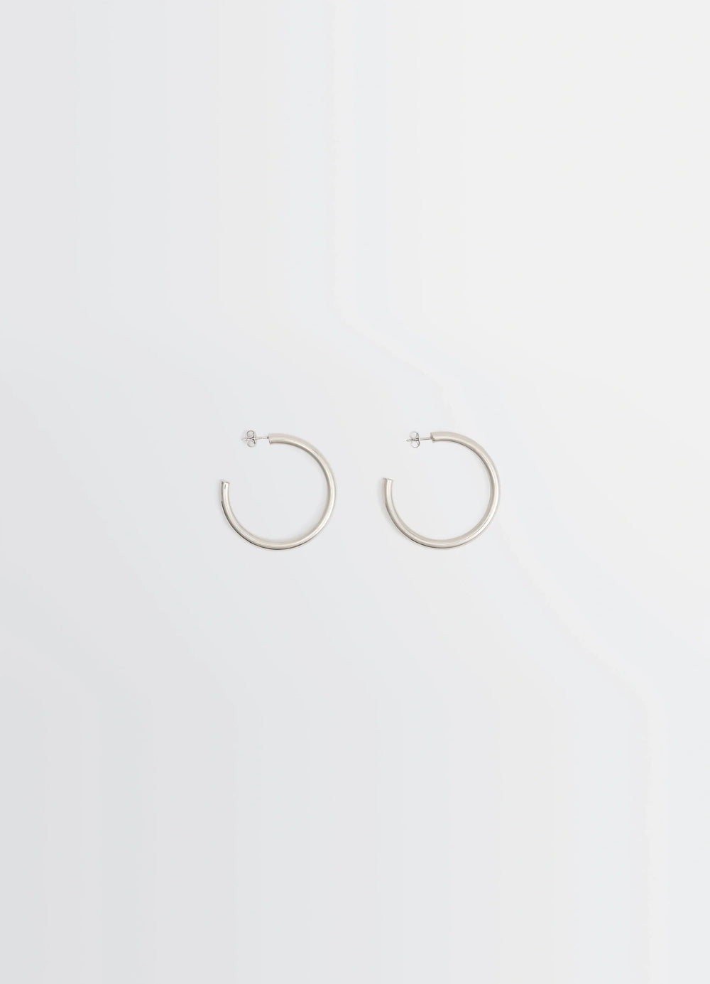 Lemaire Classic Hoops M in Recycled Rhodium-Plated Silver, product shot, Front view Medium-sized hoops