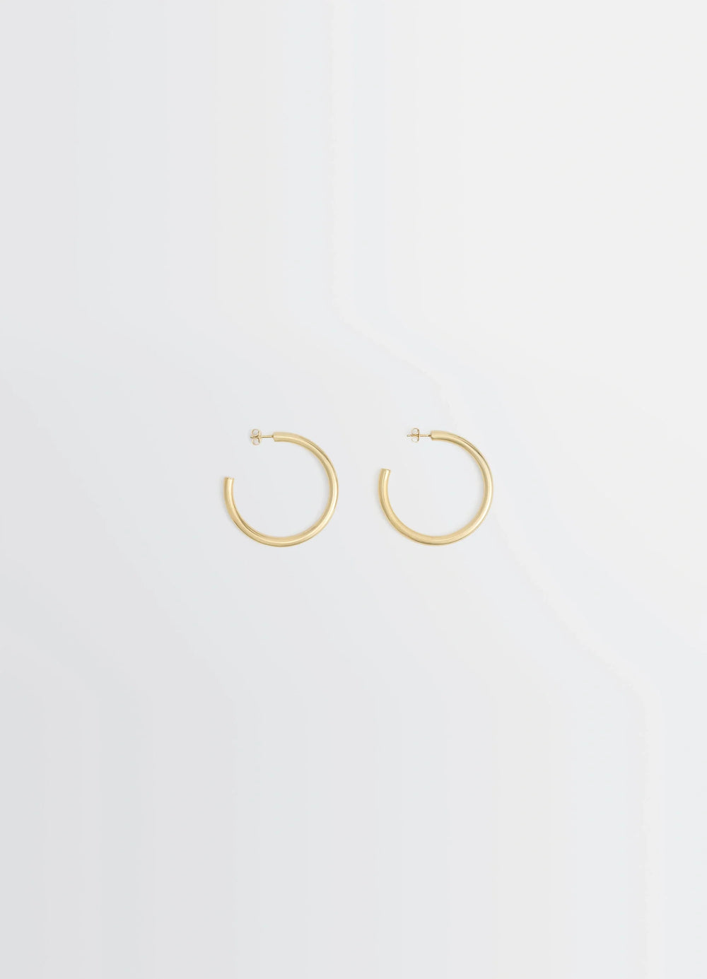 Classic Hoops M in Recycled Gold-Plated Silver, product shot, Front View Minimalist Design