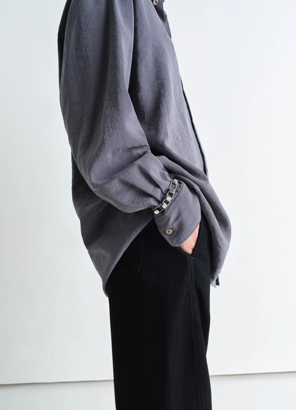 Abacus Bracelet in Shiny Silver Brass, model shot, side detail view single row styling