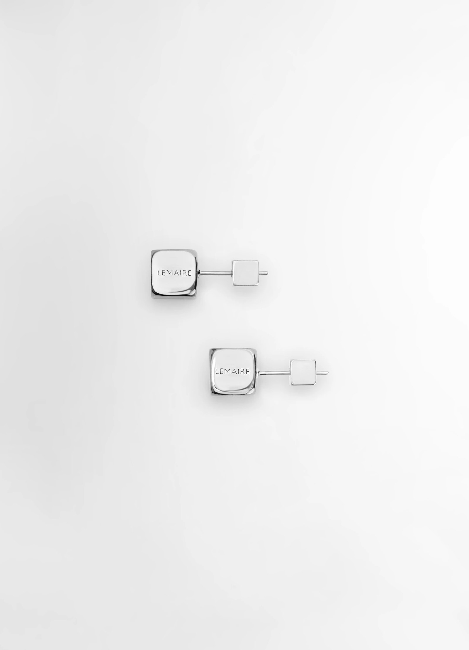 Lemaire abacus earrings in shiny silver brass, product shot, front view cubic silvery beads