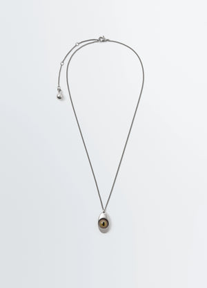 Cat Eye Pendant Necklace in Silver-plated brass, glass, product shot, Front view Reflects curiosity cabinets