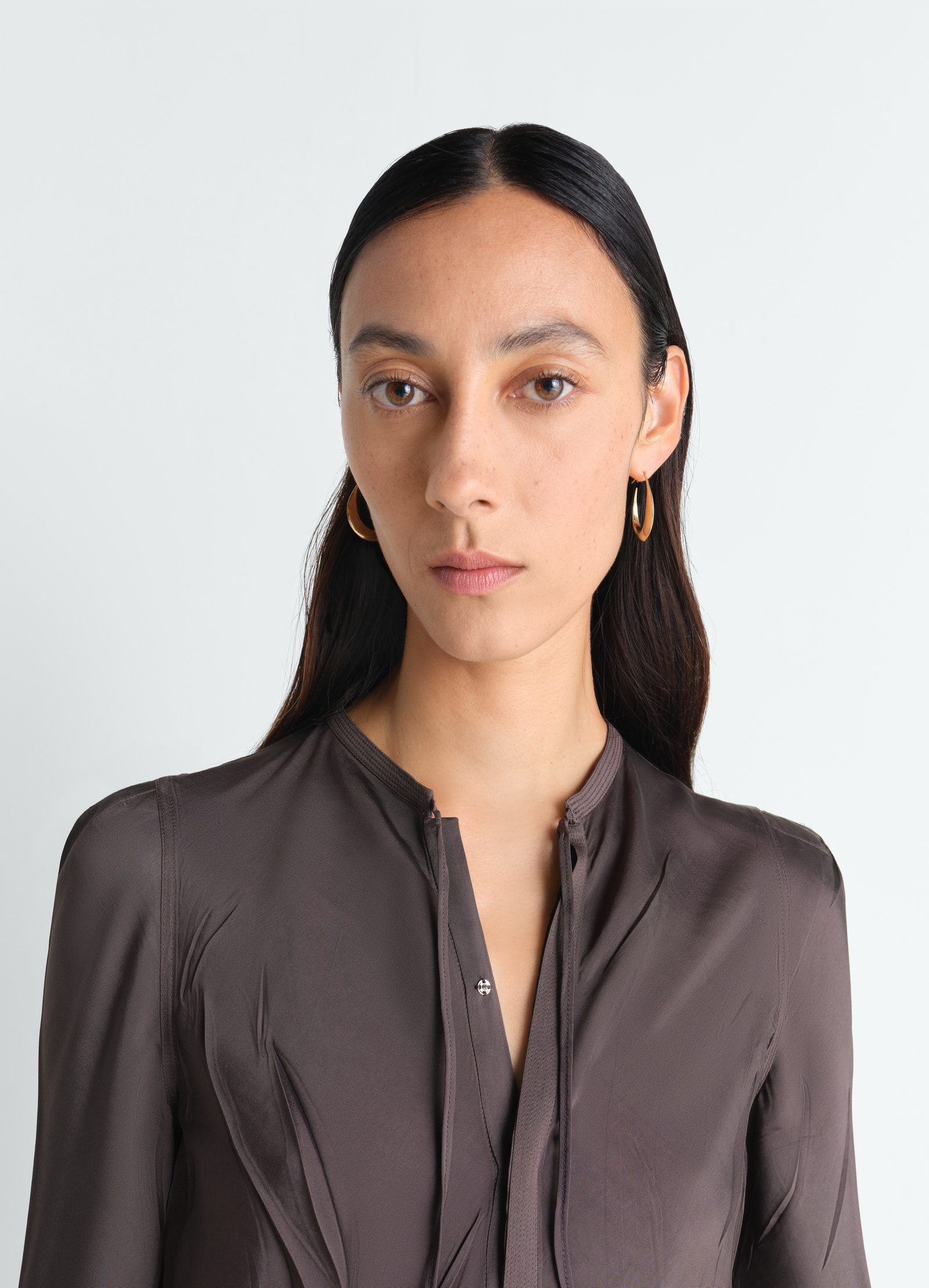 Drop hoop earrings in vermeil worn by model lemaire close-up front view