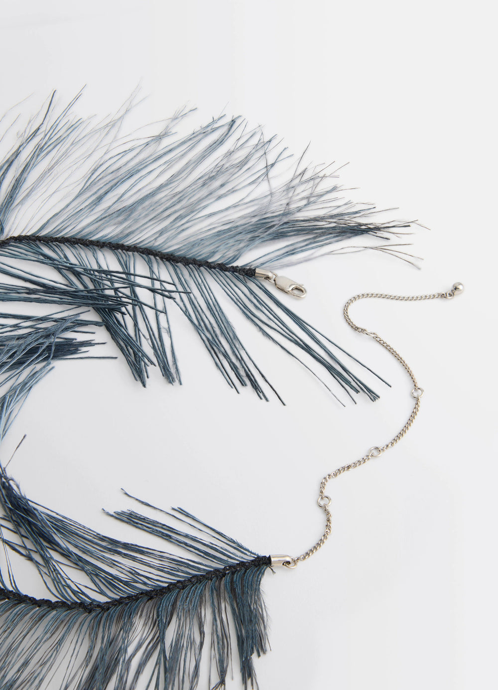 Feather Necklace in Dyed Ostrich Feathers, Silver-Plate, product shot, angled top detail fine chain texture