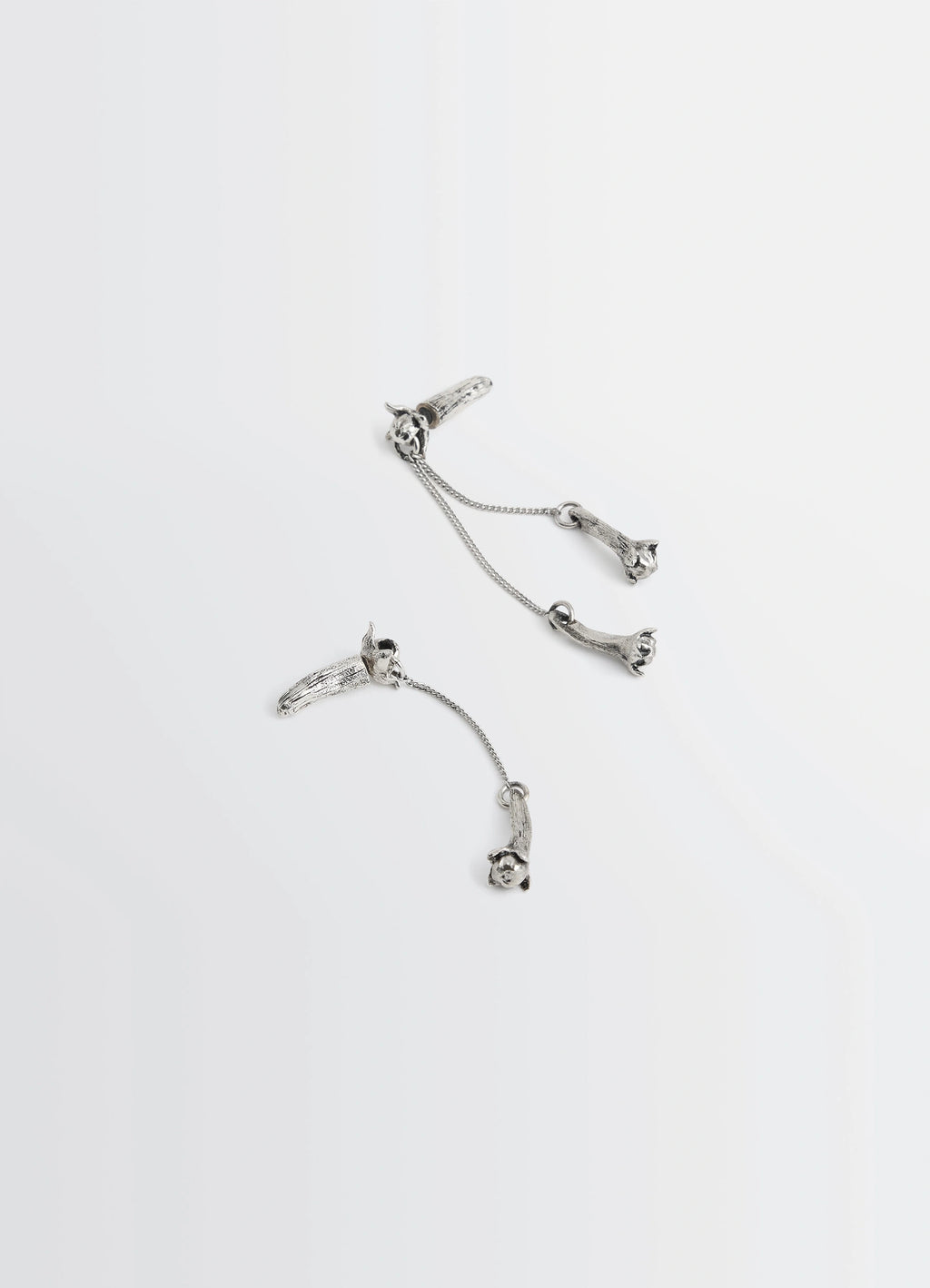 Clove Pendant Earrings in Hammered Patinated Brass, product shot, overhead detail shot fine chain accents