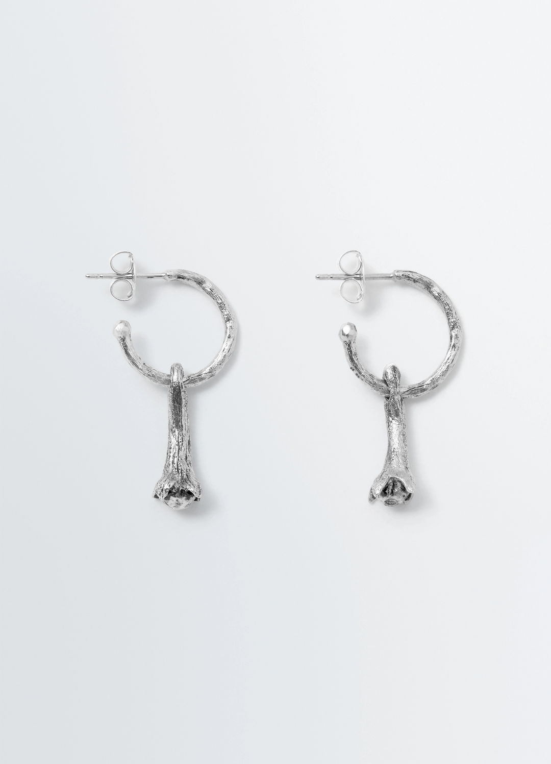 Clove Earrings in Hammered Patinated Brass, product shot, Front view Delicate clove shape