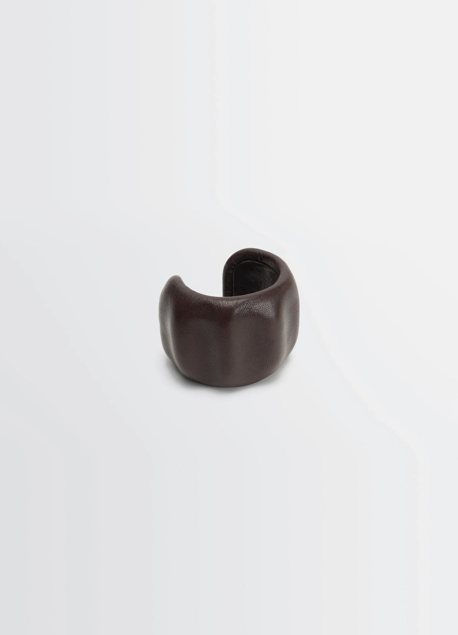Lemaire Carlos Cuff in Brown Goats Leather, product shot, angled side view molded organic form