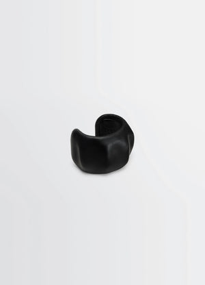 Carlos Cuff by Lemaire in Black Goats Leather, product shot, Three-quarter view Organic form