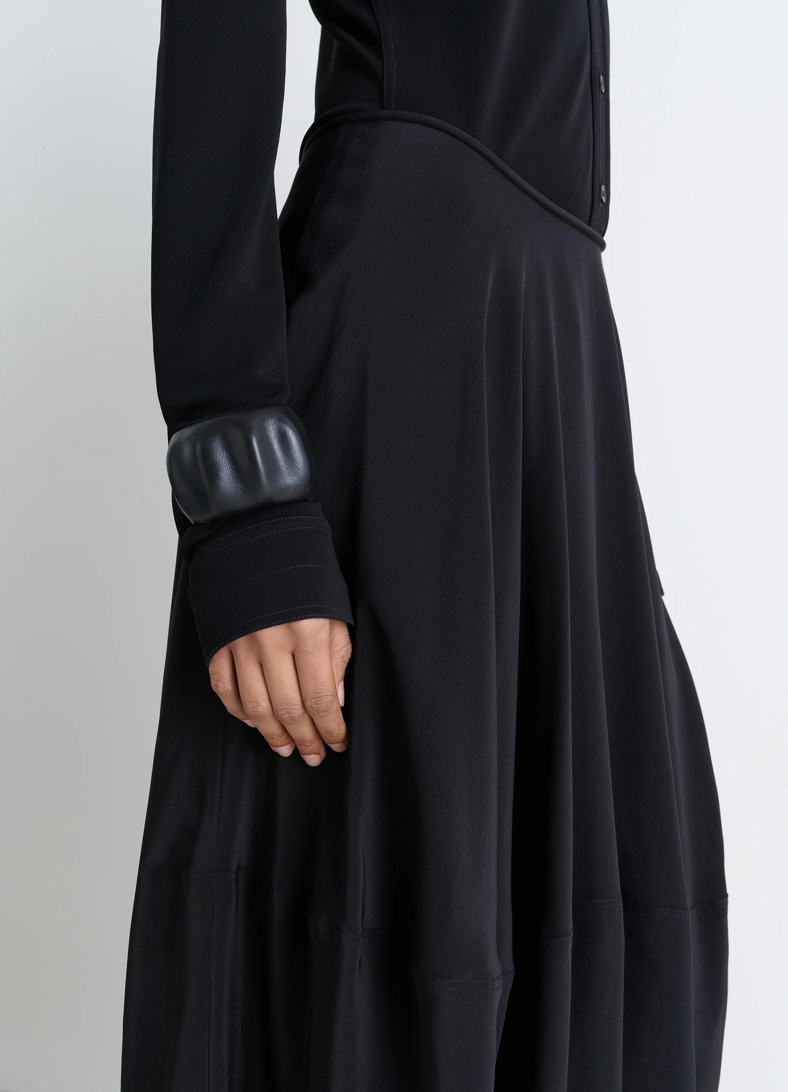 Carlos cuff by lemaire in black goats leather, model shot, side detail shot puffed texture cuff